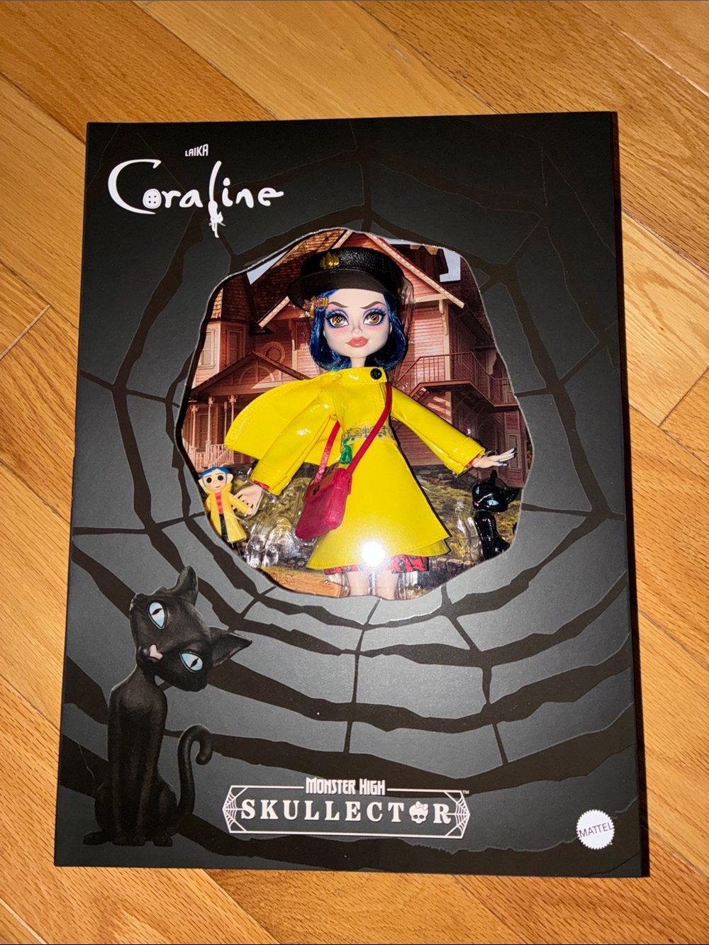 monster high Coraline Doll in Bright Yellow Coat with Pink Purse